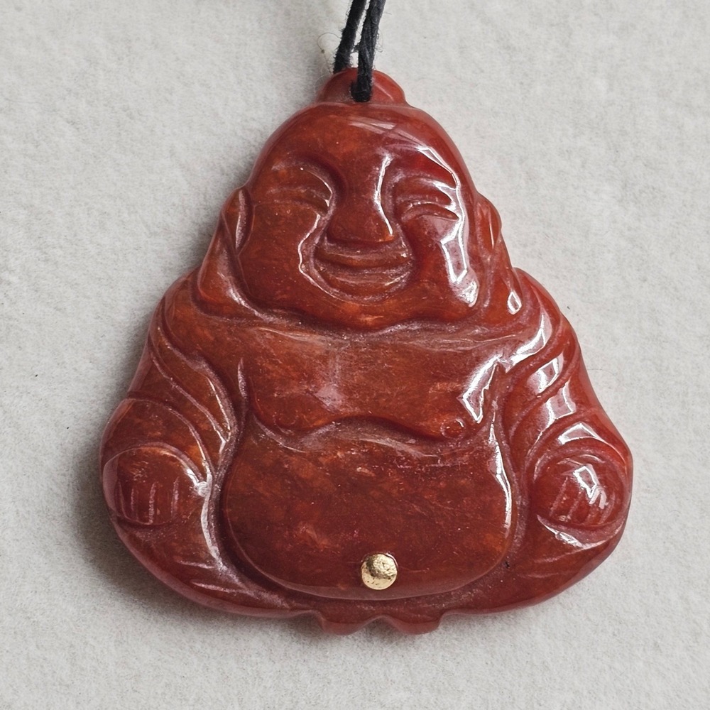 Carved Red Stone Laughing Buddha Pendant Black Cord Necklace Gold Tone Accent